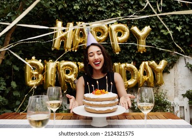Cropped portrait of an attractive young woman celebrating her birthday outdoors
