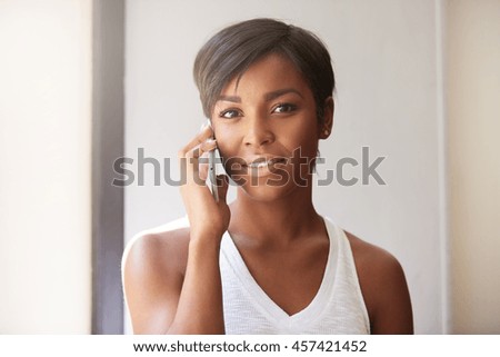 Similar – Black woman making the gesture of the horns