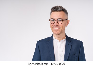 Cropped Portrait Of A Handsome Mature Businessman In Glasses Isolated Over White Background