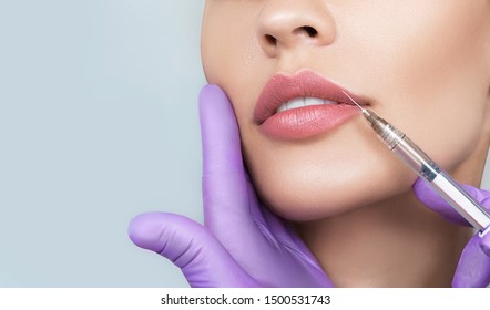 Cropped Sensual Female Lips, Procedure Lip Augmentation. Syringe Near Womans Mouth, Injections For Increase Lips Shape