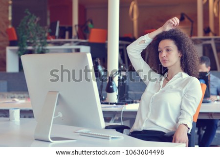 Cropped shot of an attractive young businesswoman working in her office