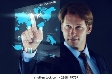 Cropped shot of a businessman touching a holographic map.All screen content is designed by us and not copyrighted by others, and upon purchase a user license is granted to the purchaser. A property