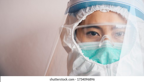 Cropped Shot Of Confidence Healthcare Worker While Wearing PPE Suit Before Working In Hospital During Covid-19 Pandemic. PPE Is Equipment That Will Protect The User Against Health Or Safety At Work.