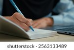 Cropped shot female hands student study use laptop write in notebook exam online education unknown muslim woman businesswoman girl employer worker writing notes business tasks schedule on table desk