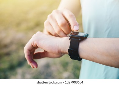 Cropped Shot Of Female Runner Checking Health Status And Fitness Progress On Her Smart Watch.