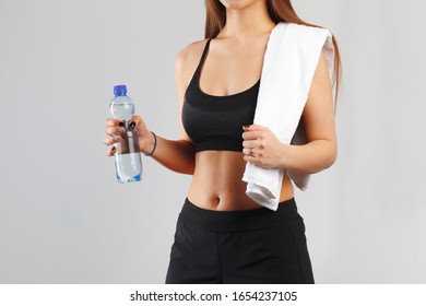 Cropped Shot Of A Fitness Woman Posing With A Towel