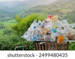 Cropped shot of lots waste bin  and garbage plastic bags over nature background. Many trash waste plastic bags, pollution garbage waste concept.