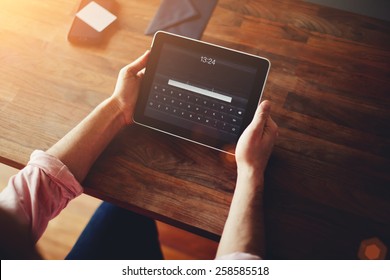 Cropped Shot Of A Man's Hands Using A Digital Tablet At Cowering Office, On Line Shopping At Home, Cross Process, Filtered Image, Data Security, Flare Light