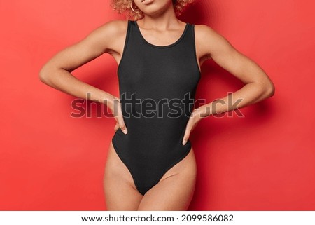 Image, Stock Photo body of a girl of athletic appearance in a black bra