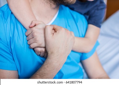 Cropped Shot Of Son Hugging Sick Father, Dad And Son In Hospital 