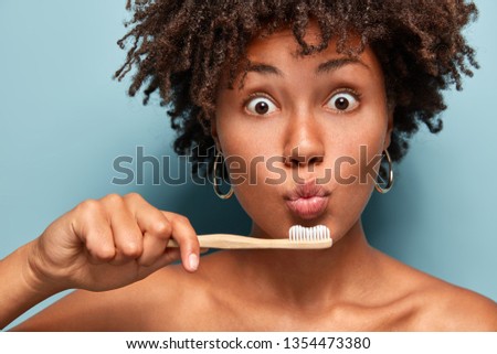 Similar – Image, Stock Photo Black toothpaste and toothbrush over grey