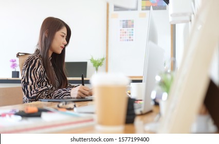 Cropped shot view designer graphic creative creativity work tablet designing design artist coloring colour ideas style networking human notebook pattern place. - Shutterstock ID 1577199400