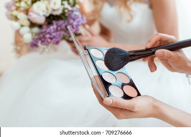 Cropped Shot Of Wedding Makeup Artist With Powder