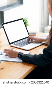 Cropped Shot Of Woman Hand Working On Laptop Computer, Mockup Blank Screen For Product Display, Vertical View,