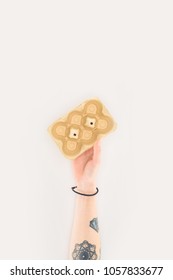 Cropped Shot Of Woman Holding Egg Carton Isolated On White