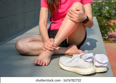 Cropped Shot Of Woman Runner Suffering Pain From Shin Splint. It Often Happens In The Front Or Inside Of The Lower Leg From Overtraining. Conceptual Of Common Running Injuries.