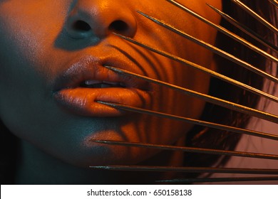 Cropped Shot Of Young African American Woman With Dangerous Needles