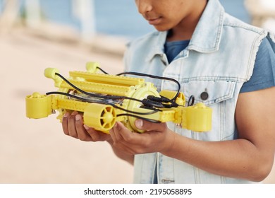 Cropped Shot Of Young Black Boy Holding Yellow Robot Model, Engineering For Kids Background