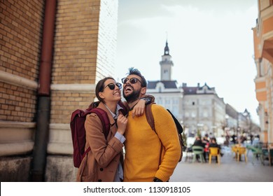 Cropped Shot Of A Young Couple Exploring A Foreign City