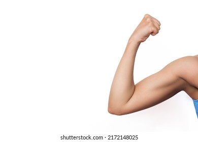 Cropped shot of young strong fit tanned woman raising arm and showing bicep isolated on a white background. Feminism, girl power, equal women's rights, independence, sports concept