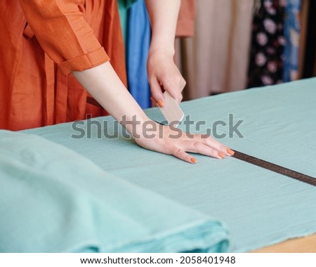 Similar – Caregiver checking blood pressure to a senior woman