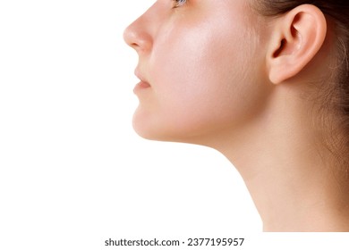 Cropped side view portrait of young woman with naked shoulders and well-kept smooth skin. Beauty face, clean, fresh. Skin care procedures. Concept of natural beauty, spa, eco-cosmetic. Copy space
