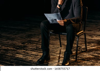 Cropped View Of African American Actor Holding Scenario On Stage During Rehearse