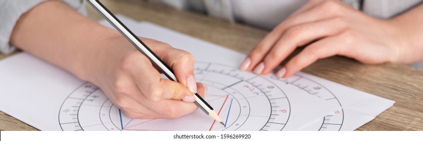 Cropped View Of Astrologer Drawing Natal Chart On Wooden Table, Panoramic Shot