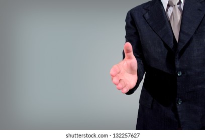 Cropped View Of Business Man Extending Hand To Shake