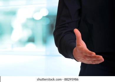 Cropped View Of Business Man Extending Hand To Shake