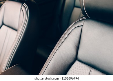 Cropped View Of A Detail Of Black Leather Handmade Upholstered Seats Of A Chic Car