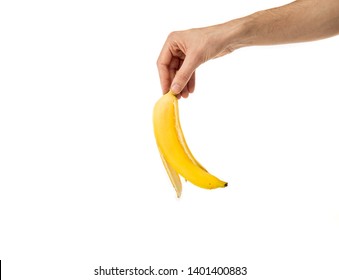 Cropped View Of Man Holding Banana Peel In Hand Isolated On White