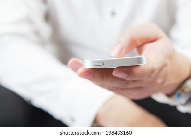 Cropped view of man using mobile phone  - Shutterstock ID 198433160