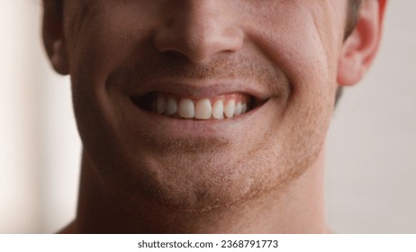 Cropped view unrecognizable Caucasian man smile toothy male teeth smiling happy joyful carefree cheerful guy home medical clinic orthodontic oral dentistry hygiene dental health whitening procedure - Shutterstock ID 2368791773