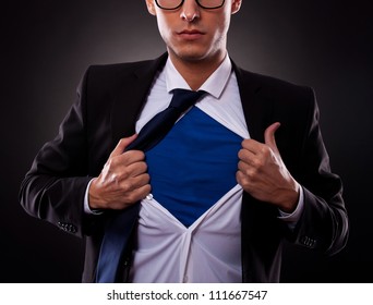 Cropped View Of Young Business Man Tearing Off His Shirt On Black Background