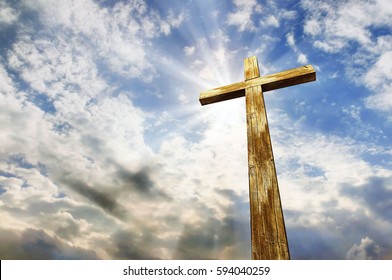 Cross against the sky. Happy Easter. Christian symbol - Shutterstock ID 594040259