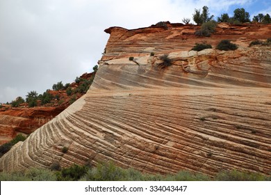 Cross Bedding Seen In The Entrada Sandstone, A Triassic/Jurassic Rock Formation Formed By Aeolian Transported Sand Which Resulted Into Dune Deposits Over Geologic Time, Kanab, Utah, USA