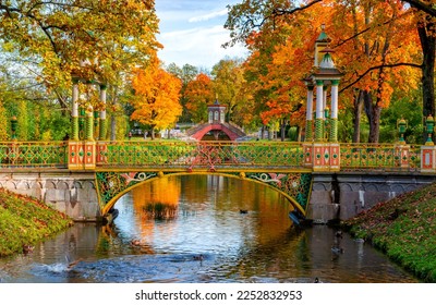 Cross bridge and Chinese bridges in Alexander park in autumn, Pushkin, Saint Petersburg, Russia - Shutterstock ID 2252832953