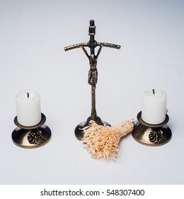 cross, candles and sprinkler