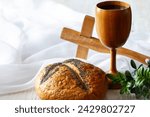 Cross, chalice with wine and bread, Last Supper and Passion of Christ concept