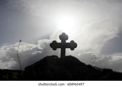 cross in the clouds