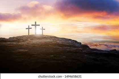 cross crucifixion jesus christ on the mountain at sunset abstract concept