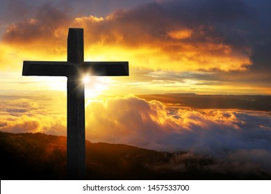 Cross, crucifixion, Jesus Christ, with the sky and the sun as the background - Shutterstock ID 1457533700
