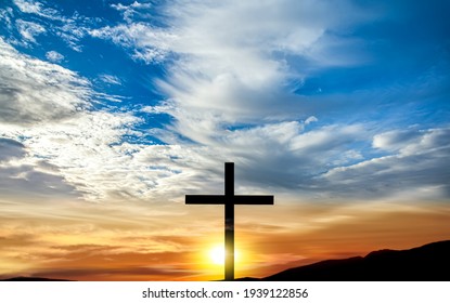 The cross of God in the rays of the sun. Background of religions