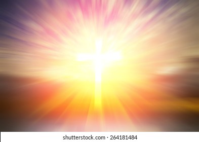 Cross of hope and faith in God and in the background rays of sunset. religious abstract composition