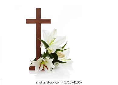 Cross with lilies isolated on white background for decorative design. Spring background. Easter card.