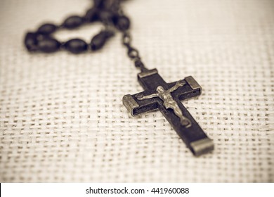 Cross Necklace Vintage Style On Fabric.