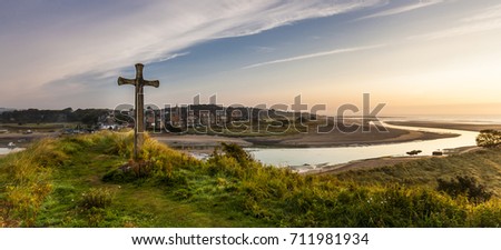 The Cross on Church Hill, Alnmouth, Northumberland, England, UK. At sunrise/dawn. The hill is the site of the ancient parish church of St Waleric. Long since destroyed.