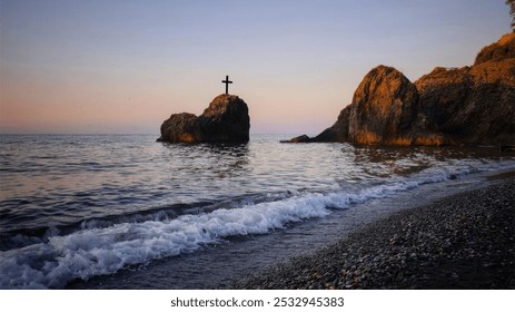 Cross on cliff ocean waves landscape - Powered by Shutterstock