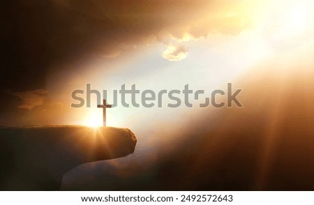 Cross on the cliff with sunlight and clouds. 3d illustration.